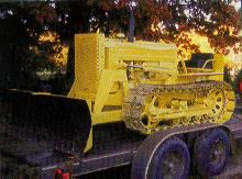 This is a picture of a 420C, out of the December 2000 Green Magazine, in the For Sale section. Is it me or does it look like normal Deere yellow? It could also be primer.