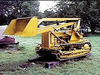 This is a yellow 420C with loader that was for sale at Ytmag.com